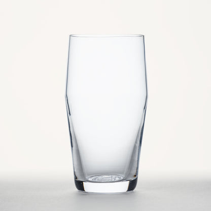 Clear standard pint glass with tapered sides and thick base, shown in front view against a plain white background.