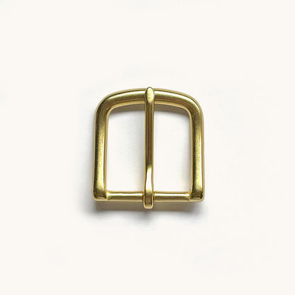 Natural brass Classic Belt buckle with rounded edges, displayed on a white surface.
