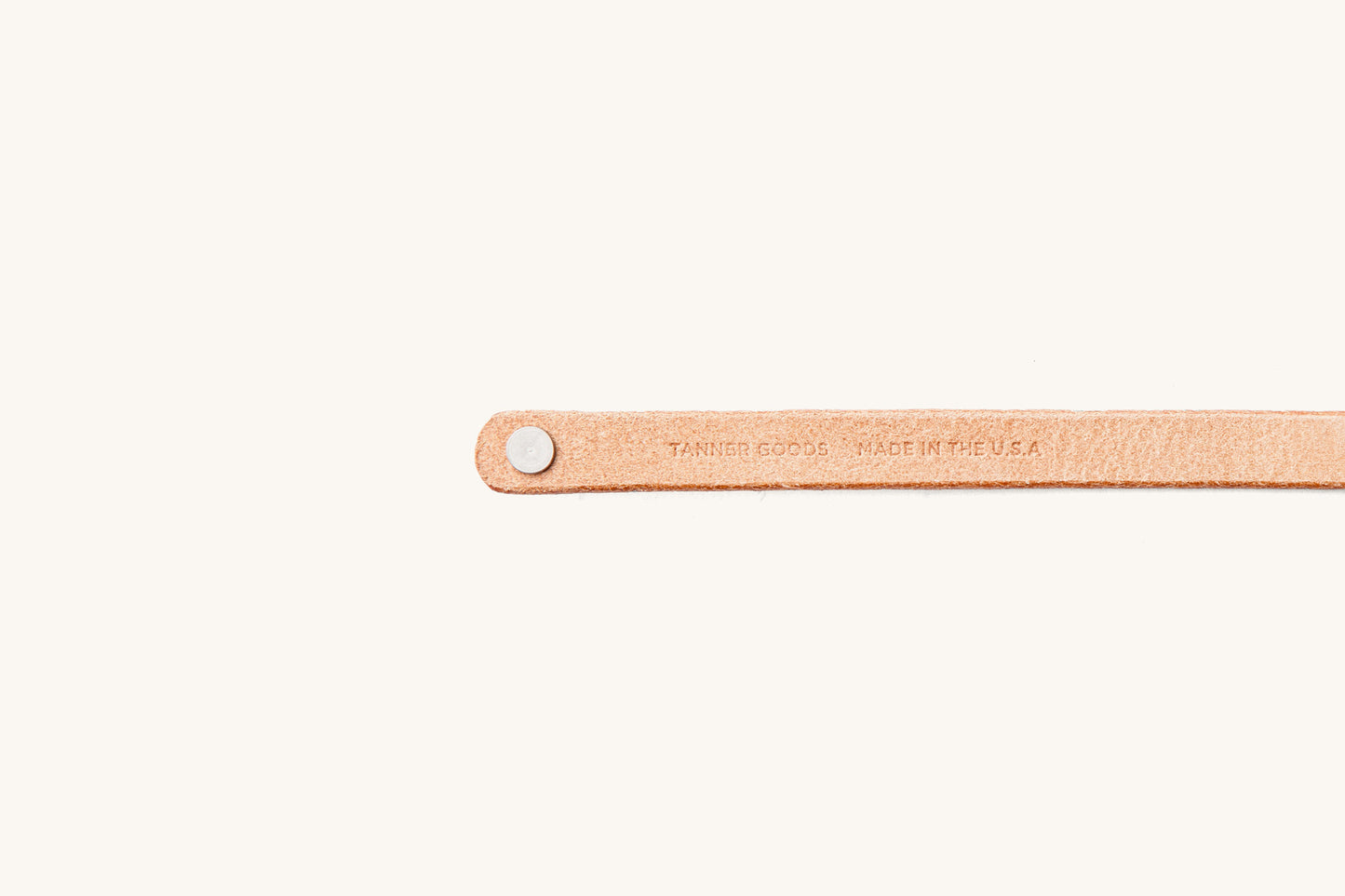 Tanner Goods and Made in the USA monograms on underside of leather wristband.